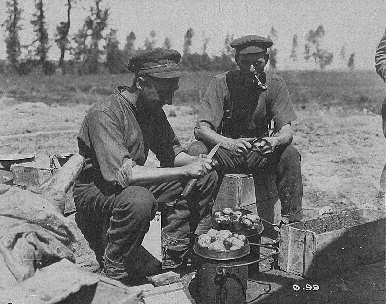 Canadian soldiers peeling potatoes - Canadian Official War Photographs